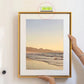 Porte-clés niveau à bulle utilisé pour aligner parfaitement un cadre photo au mur