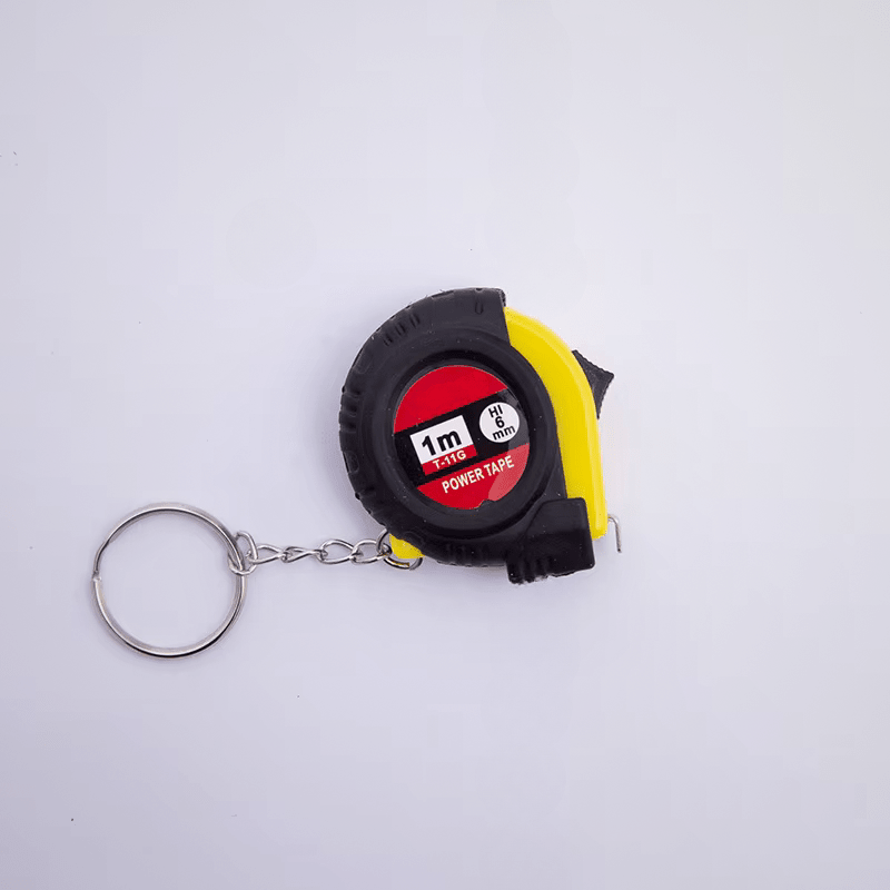 Mètre-ruban miniature porte-clés 1m Power Tape T-11G – coloris jaune et noir, ruban 6mm, fond blanc