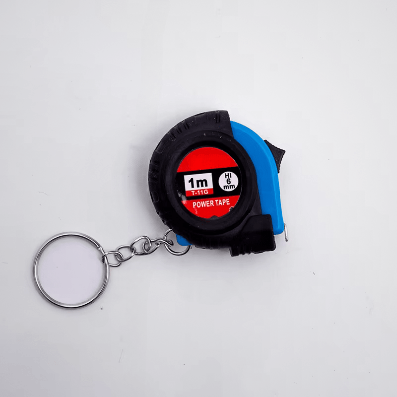 Mètre-ruban miniature porte-clés 1m Power Tape T-11G – coloris bleu et noir, ruban 6mm, fond blanc