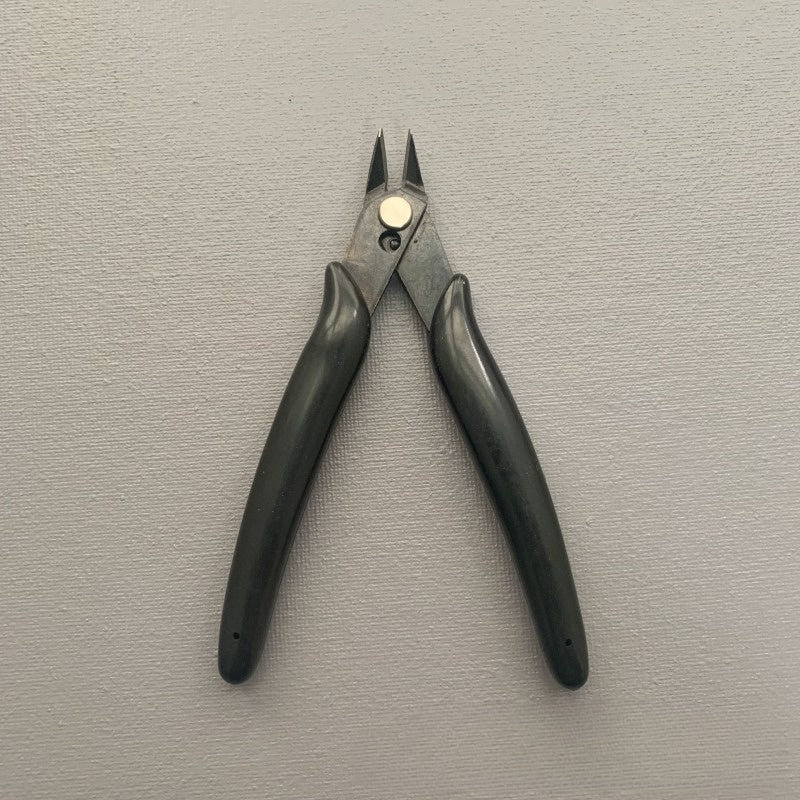 Pince à Sertir Noir
