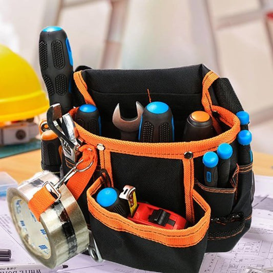 Sac à outils pour taille noir avec bandes orange, rempli d'outils et tournevis, avec ruban adhésif attaché