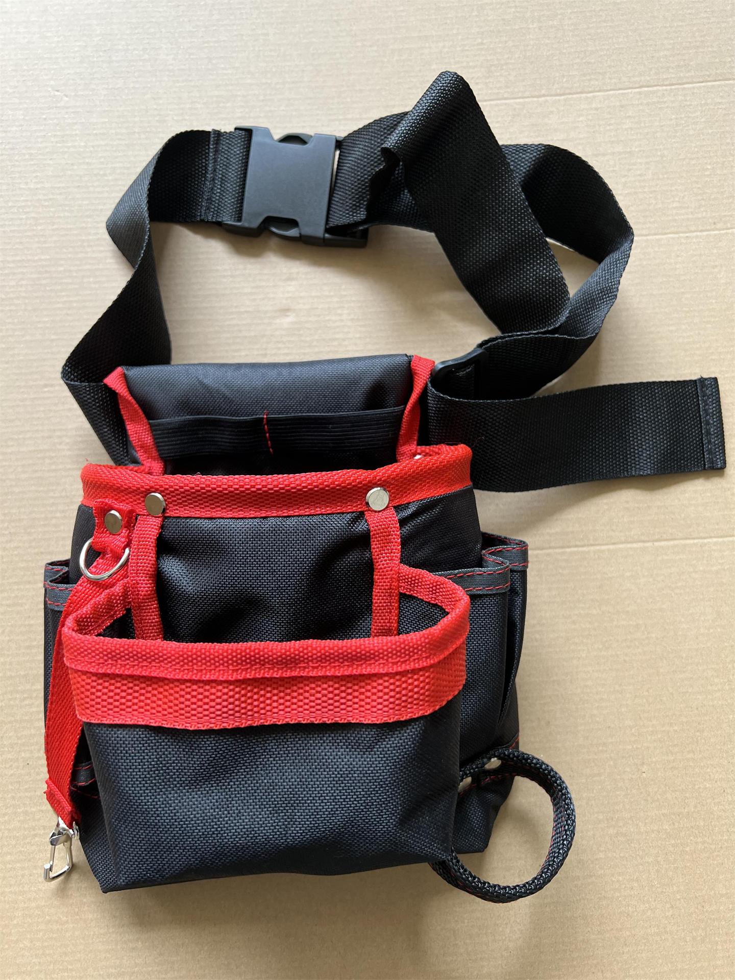 Sac à outils pour taille noir avec bandes rouges, ceinture ajustable et boucle de fixation