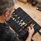 Sac à outils enroulable ouvert avec outils organisés